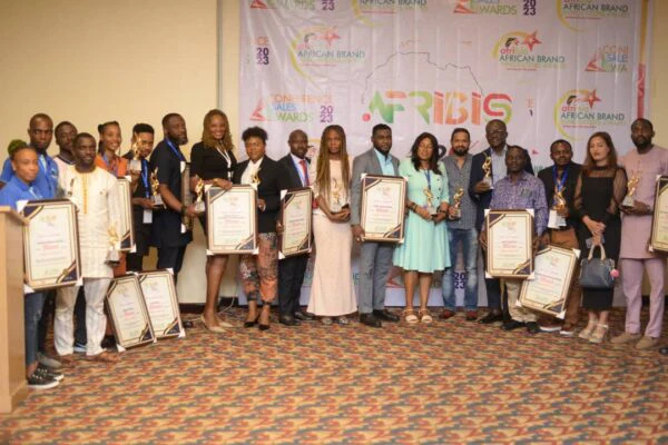 Award recipients gather with certificates at the African Brands and Innovation event.
