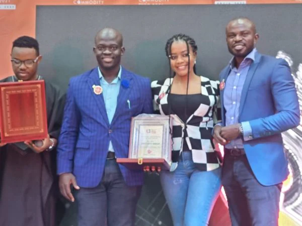 Softcity representatives display the Focus Africa Series recognition.